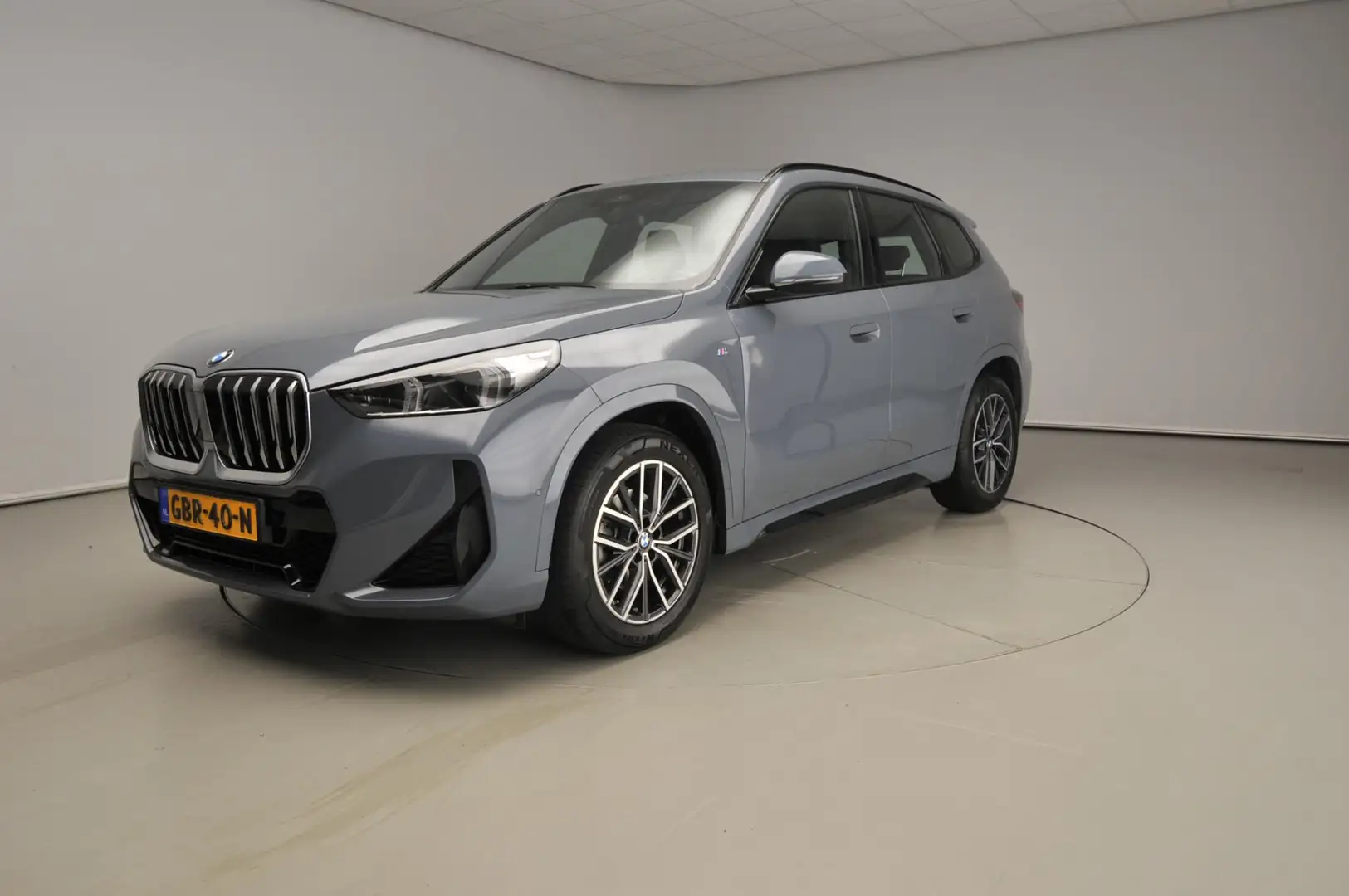 BMW X1 sDrive18d | M-Sportpakket | LED | Navigatie | Trek Gris - 1