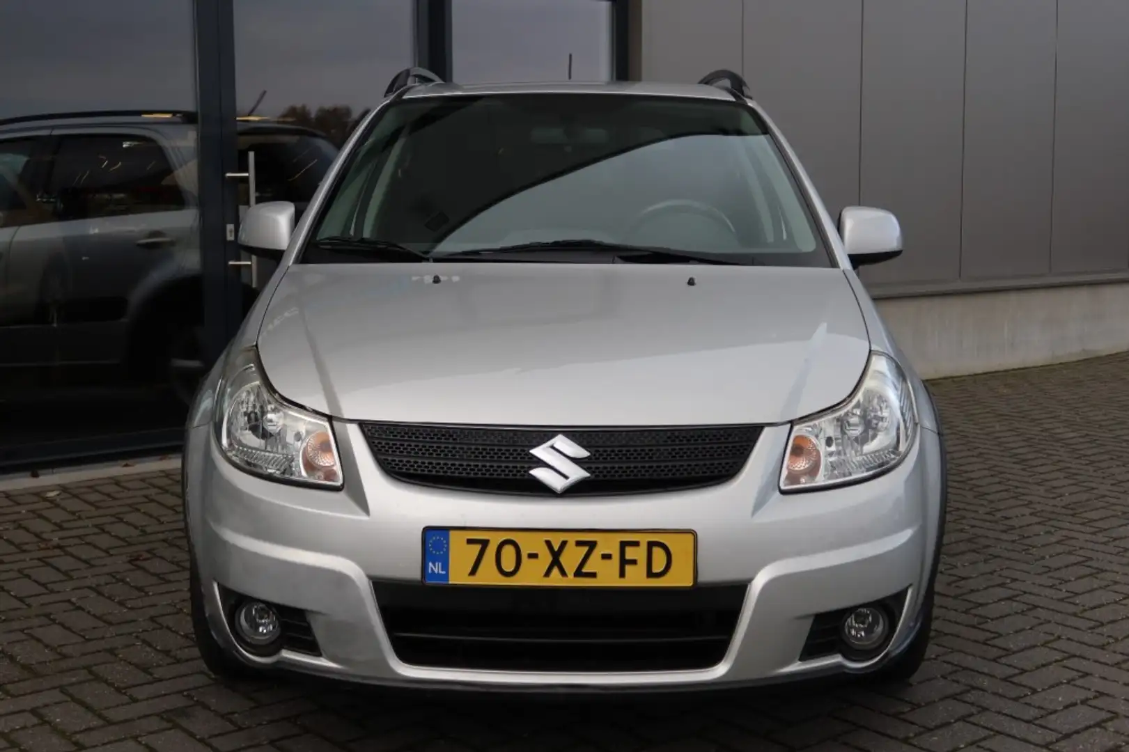 Suzuki SX4 1.6 Exclusive Airco, LM-Velgen, 1e eigenaar, Deale Grau - 2
