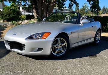 Convertible with tonneau and OEM hardtop.