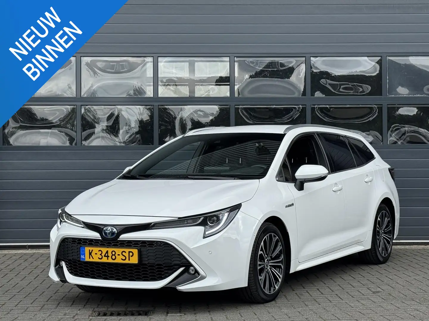 Toyota Corolla TOURING SPORTS 1.8 HYBRID EXECUTIVE I AUTOMAAT I A Wit - 1