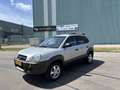 Hyundai TUCSON 2.0-16V Active 142 PK. Zilver - thumbnail 1