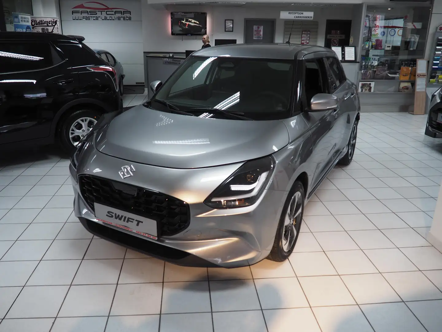 Suzuki Swift 1.2 GLX Gris - 1