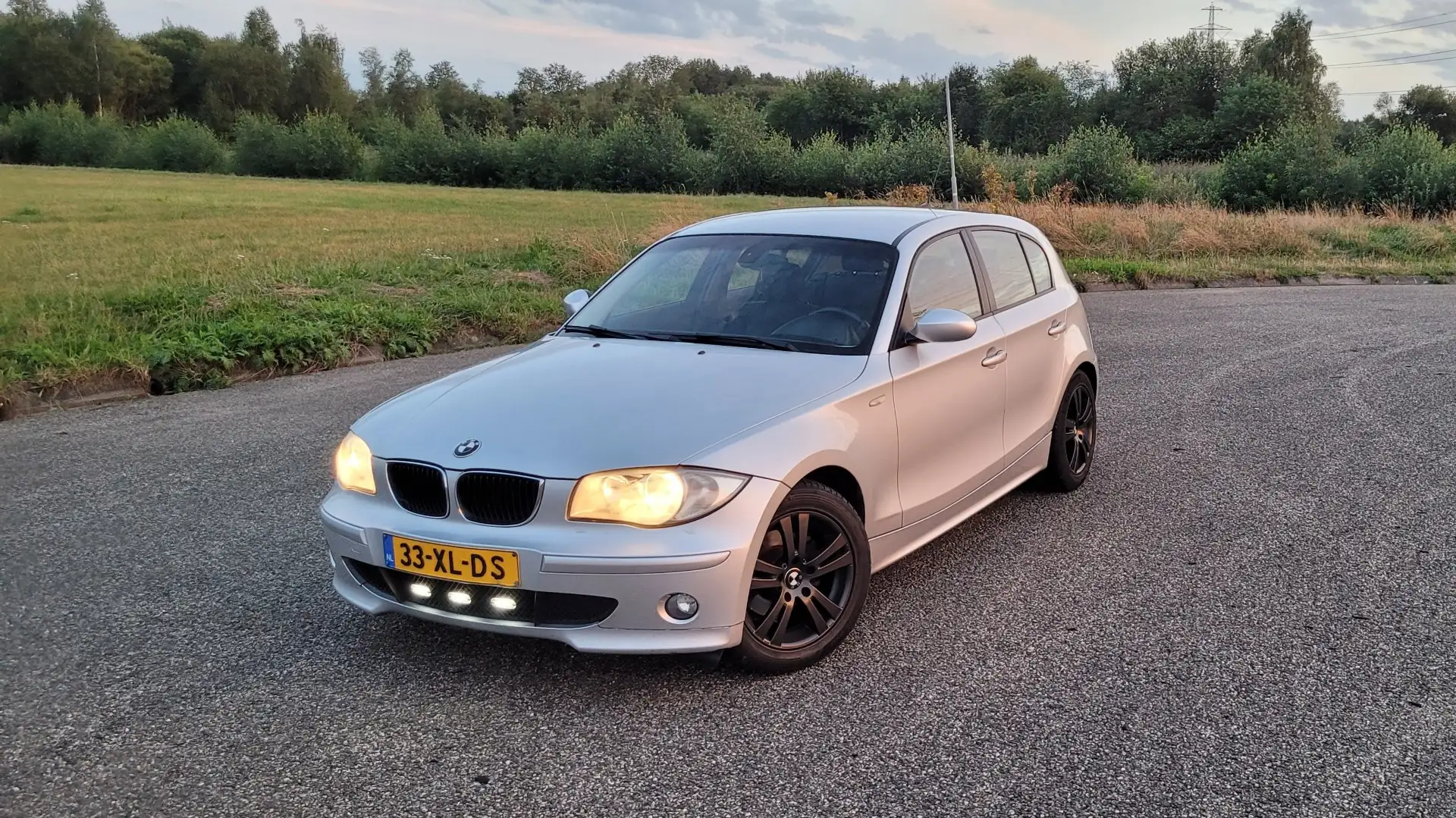BMW 116 BMW 1-serie 116i High Executive Zilver - 1