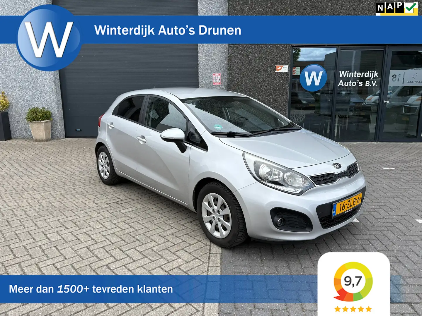 Kia Rio 1.2 CVVT Comfort Pack Airco! 5Drs! Elek.r! Trekhaa Grijs - 1