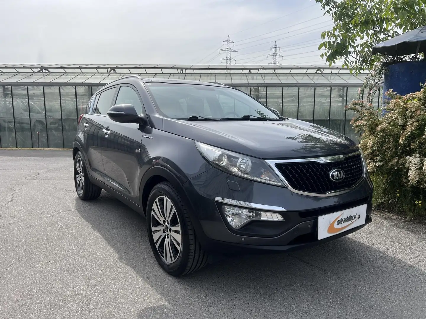 Kia Sportage Platin 2,0CRDi AWD Aut AHK Servicebuch Navi Kamera Grigio - 1