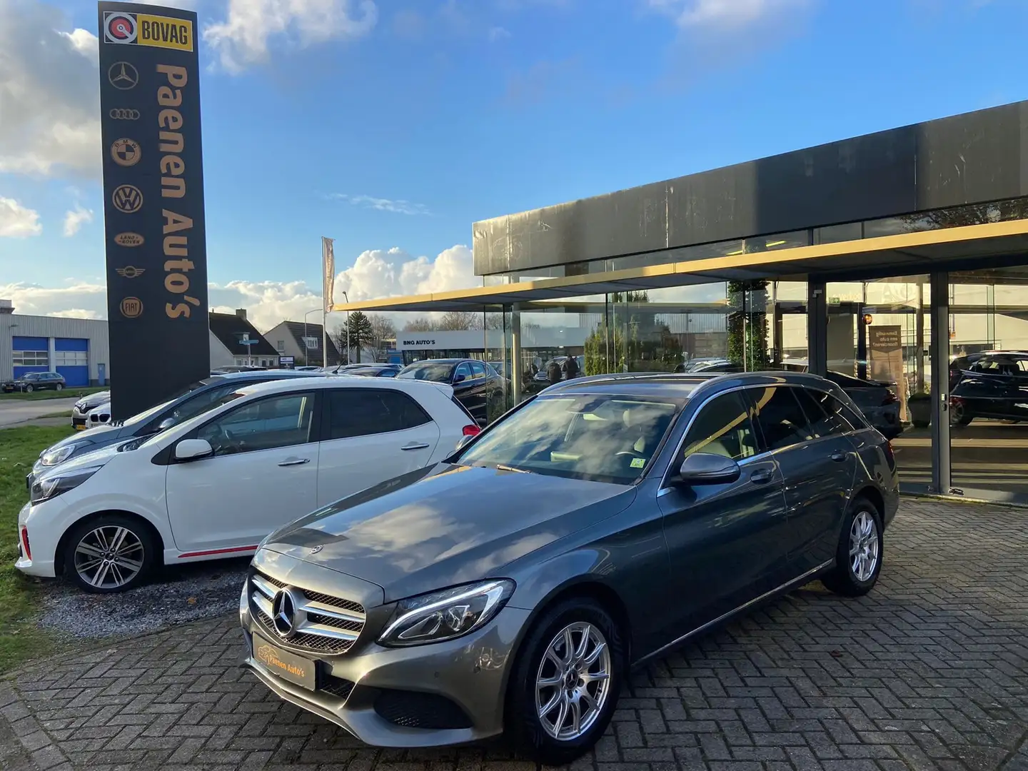 Mercedes-Benz C 180 Estate Business Solution|CC|Clima|1e Eigenaar Gris - 1
