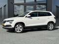 Skoda Karoq 1.0 TSI Amb. Bns Verw. Sportstoelen | Trekhaak | P Wit - thumbnail 1