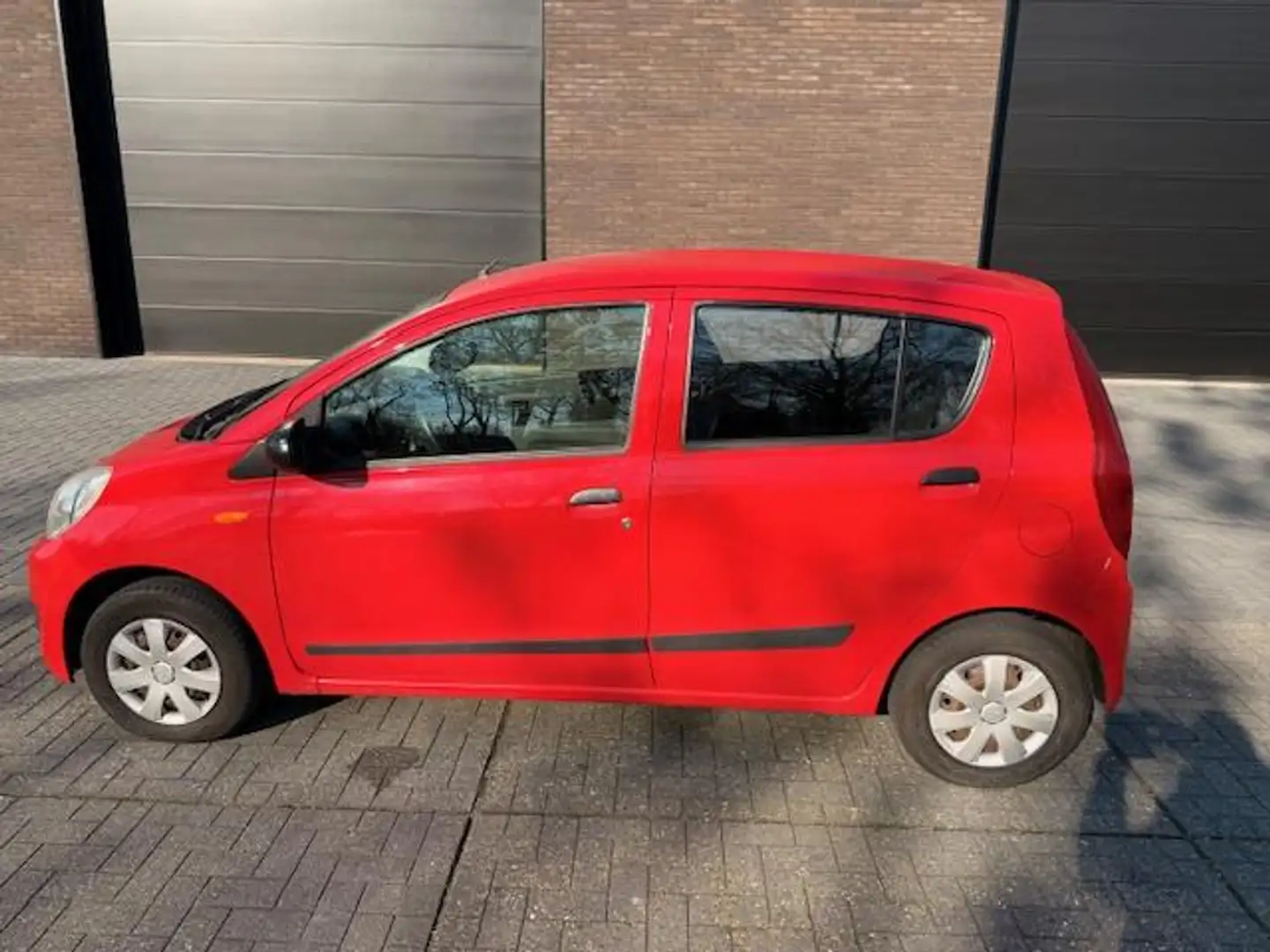 Daihatsu Cuore 1.0 Trend | 5 DEURS| STUURBEKR.| 130646KM | Rouge - 2