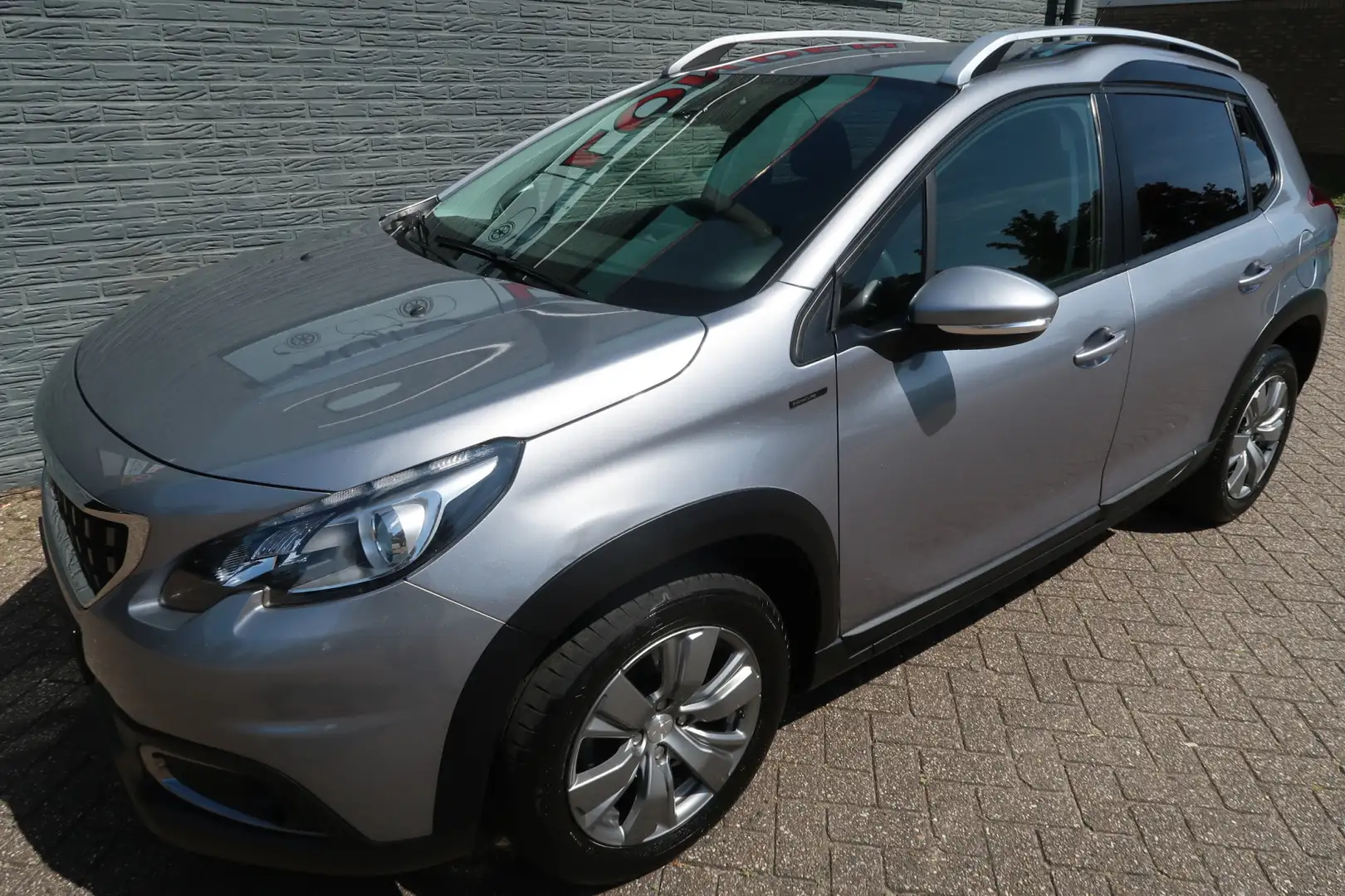 Peugeot 2008 1.2 PureTech Allure Eerste eigenaar nieuwe distrib Grau - 1