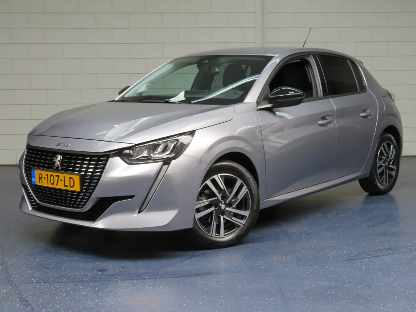 Peugeot 208 1.2 PT Allure Pack Grijs - 1