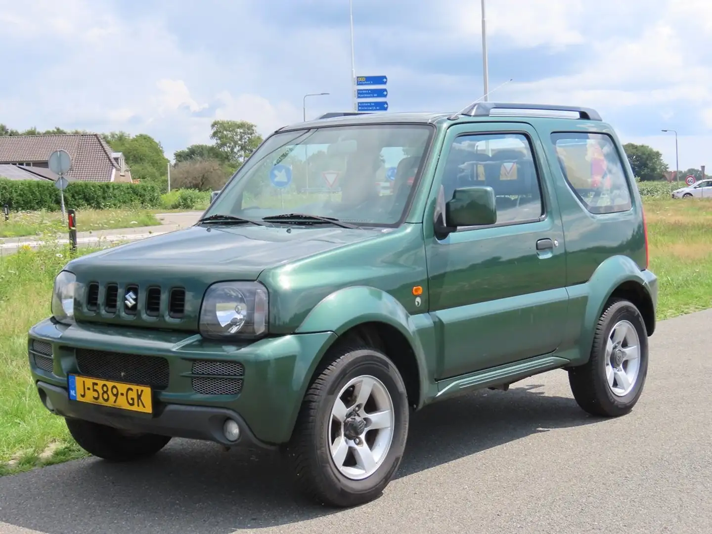 Suzuki Jimny 1.3 Exclusive 4WD, Airco, Trekhaak, El. Ramen, CV Verde - 2