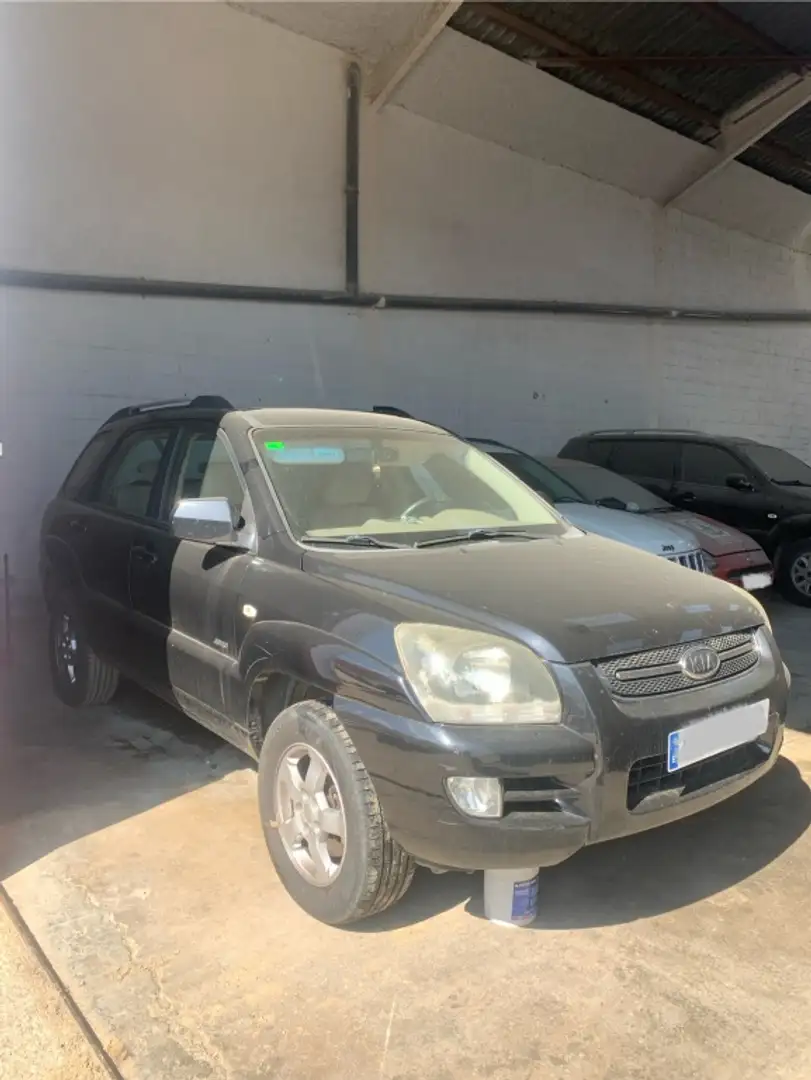 Kia Sportage 2.0CRDI Active 4x4 Schwarz - 1