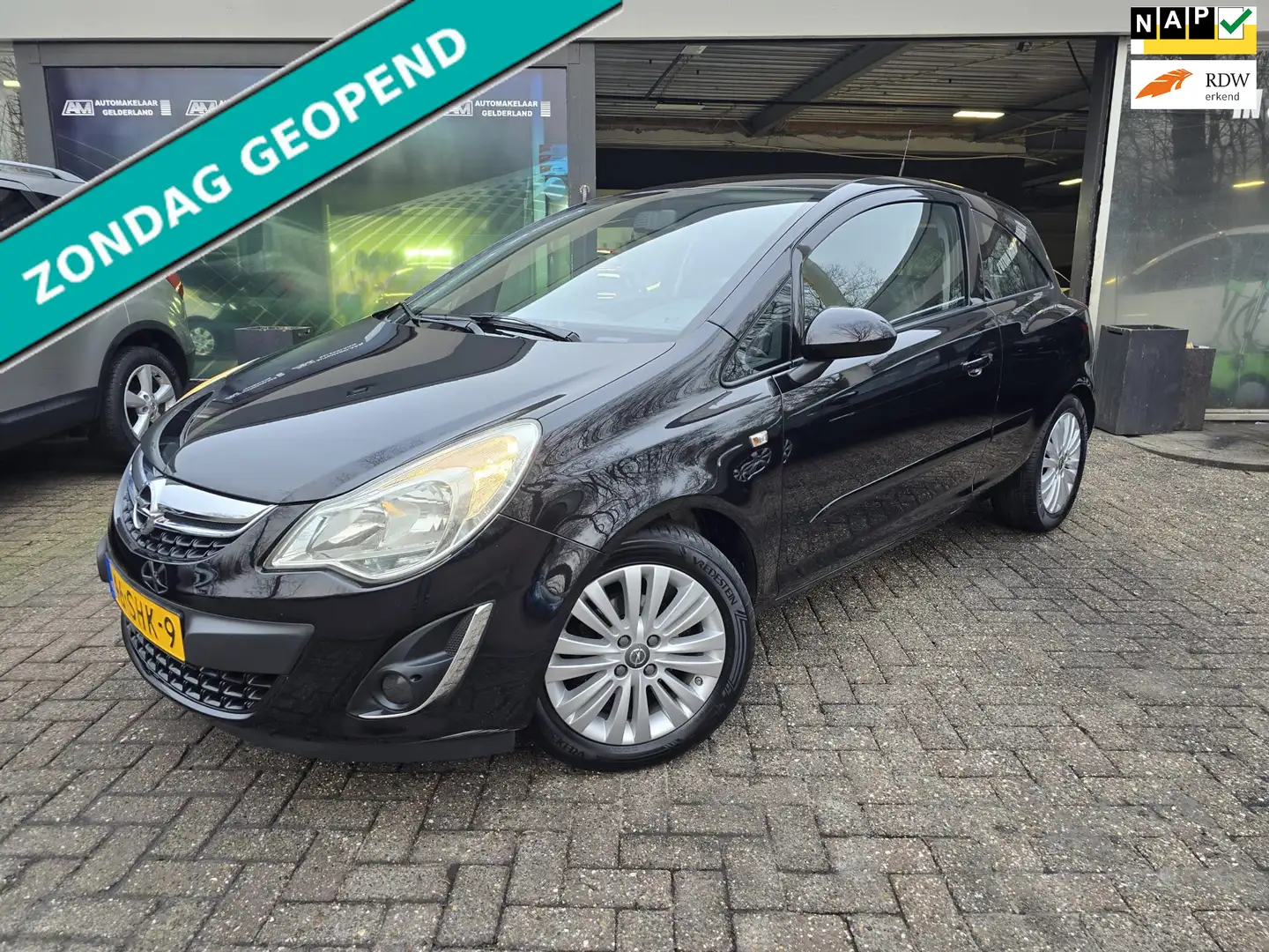 Opel Corsa 1.2-16V Cosmo | 1E EIGENAAR | 12MND GARANTIE | NAV Schwarz - 1