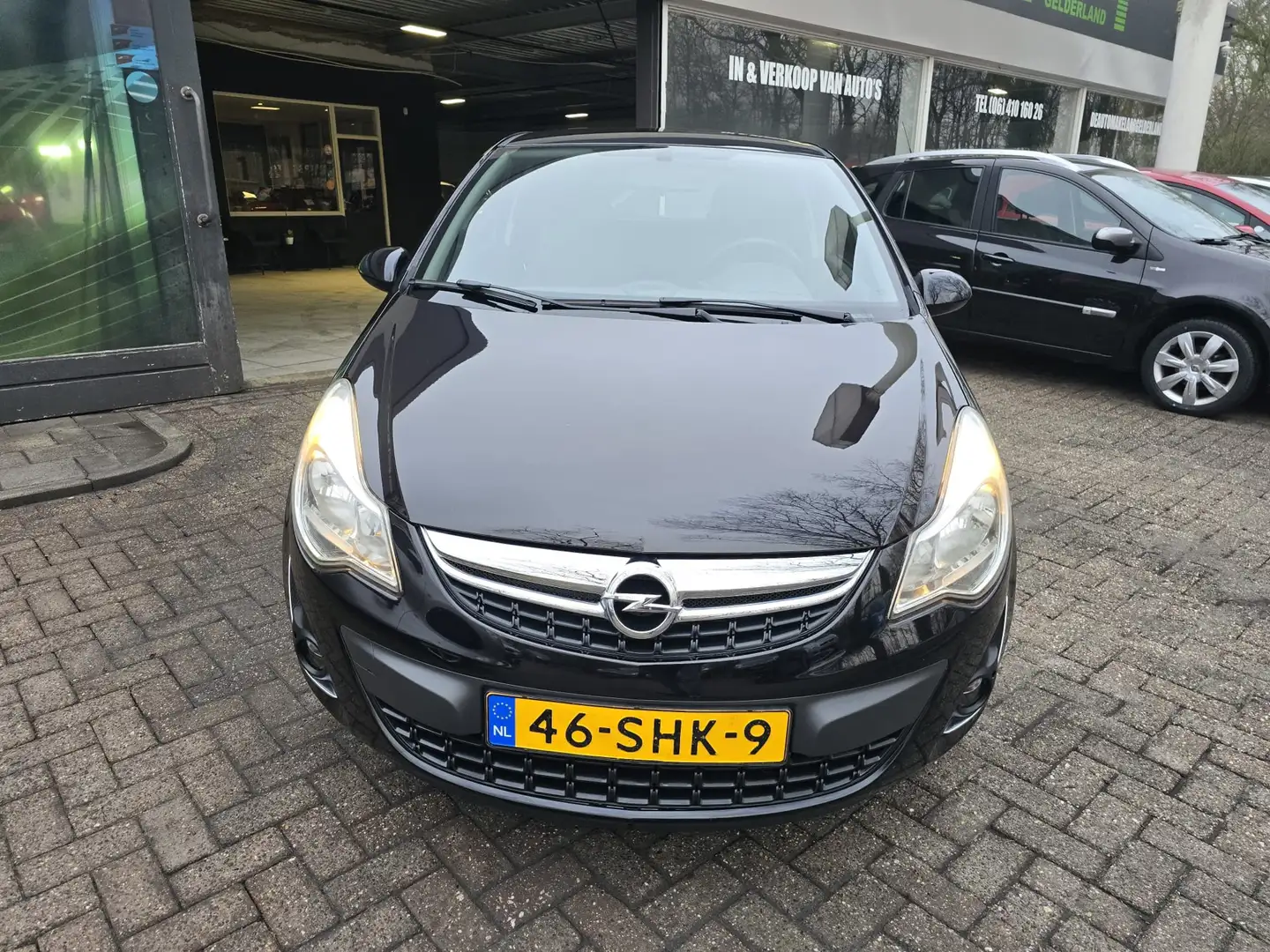 Opel Corsa 1.2-16V Cosmo | 1E EIGENAAR | 12MND GARANTIE | NAV Schwarz - 2