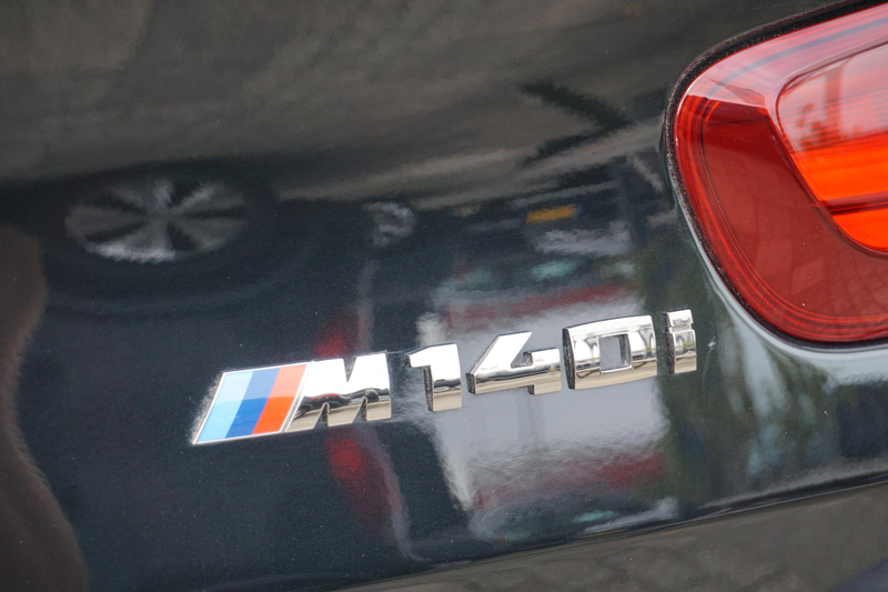 BMW 140 1-serie M140i High Executive — photo 30
