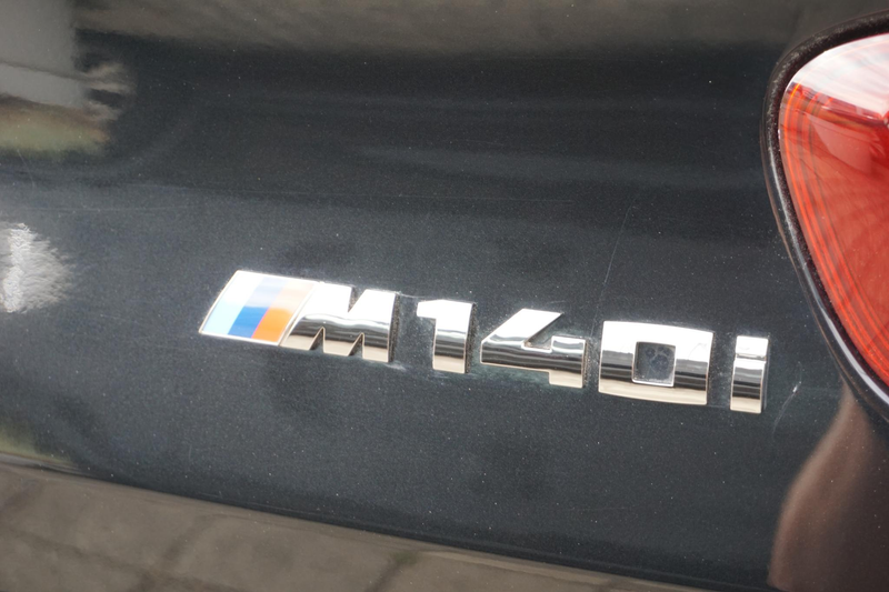 BMW 140 1-serie M140i High Executive — photo 23