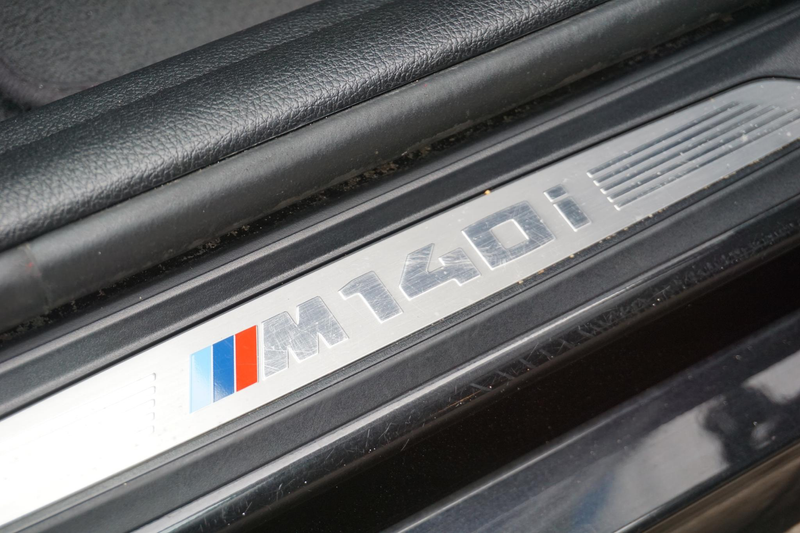 BMW 140 1-serie M140i High Executive — photo 19