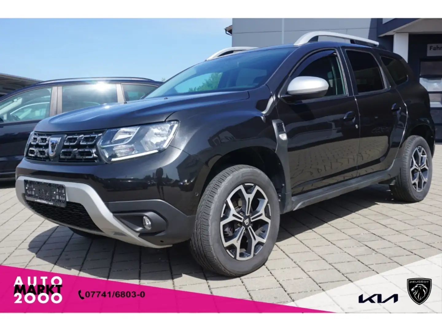 Dacia Duster dCi 115 4WD Prestige AHK Navi SHZ PDC Leder LM Kam Schwarz - 1