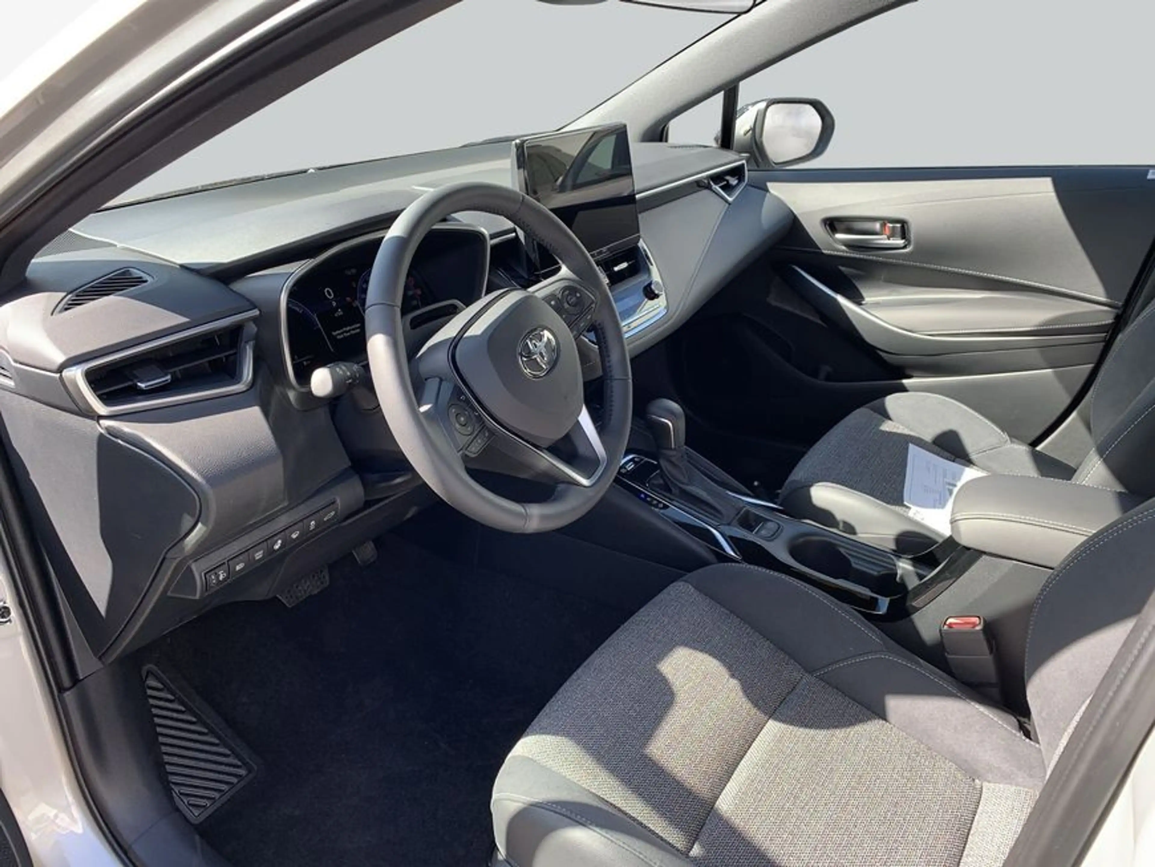 Toyota Corolla 2.0 Hybrid Touring Sports Teamplayer 98 kW — photo 9