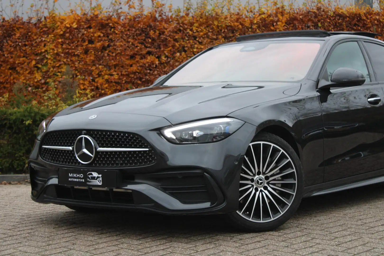 Mercedes-Benz C 180 AMG | Panoramadak | Sfeerverlichting | 360 camera Grijs - 2