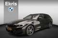 BMW 320 3 Serie Touring 320e | M-Sportpakket | LED | HUD | Zwart - thumbnail 1