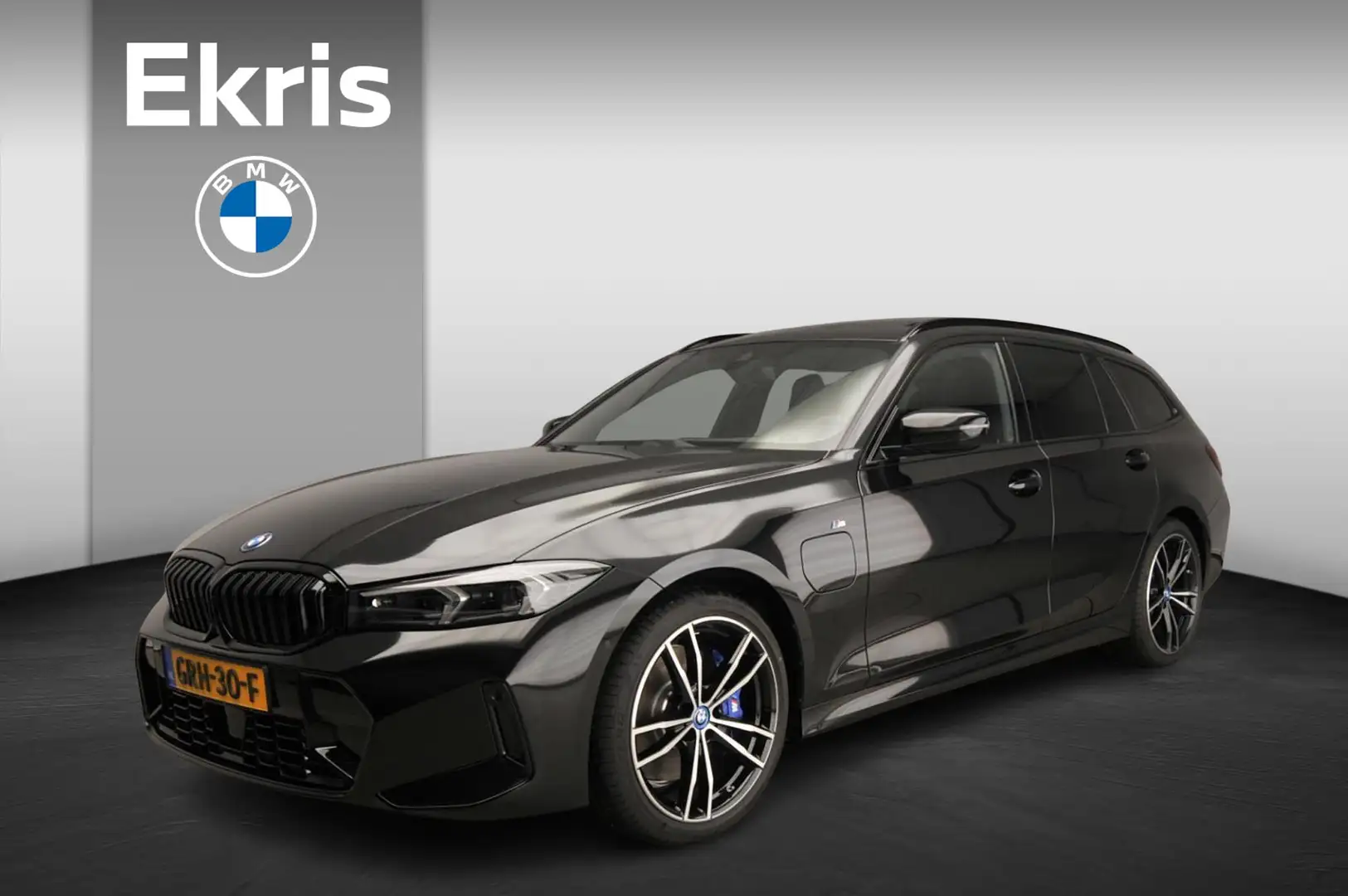 BMW 320 3 Serie Touring 320e | M-Sportpakket | LED | HUD | Zwart - 1