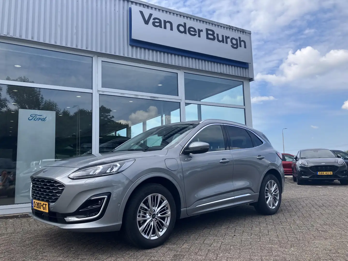 Ford Kuga Vignale 2.5 Plug-in Hybrid 225pk e-CVT 24.478 km Grijs - 2