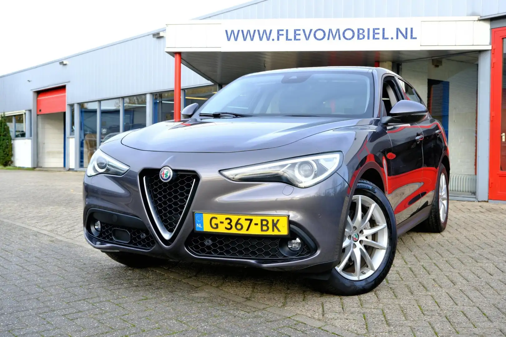 Alfa Romeo Stelvio 2.2d 180pk Super Aut. Xenon|Clima|Navi|DAB+|Half L Grijs - 1