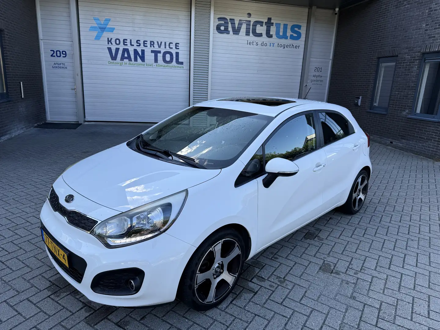 Kia Rio 1.2 CVVT Super Pack NAP/APK/Schuifdak/keyless Wit - 1