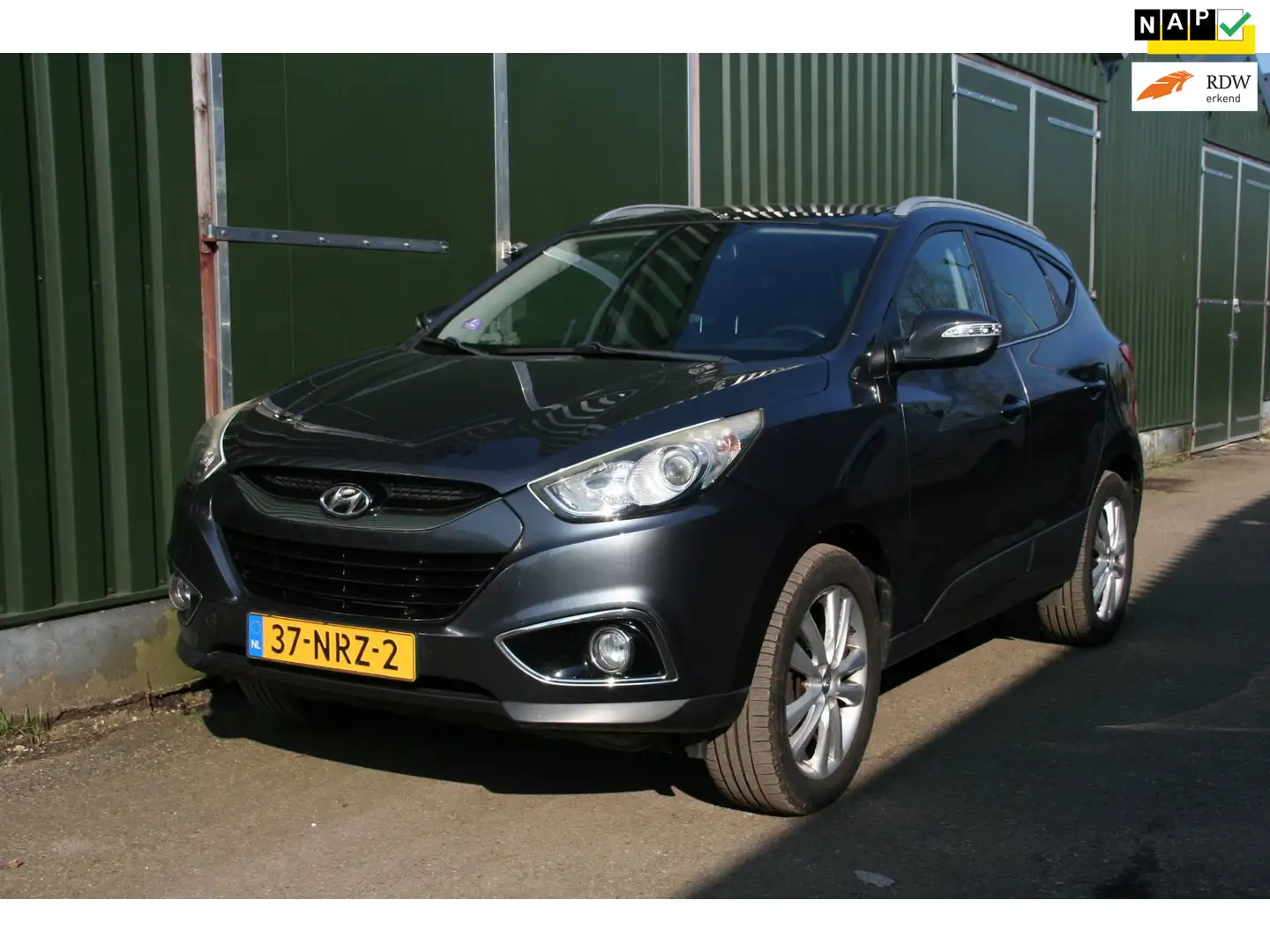 Hyundai iX35 2.0i i-Catcher, LEER, NAVIGATIE, AIRCO, TREKHAAK, Grau - 1