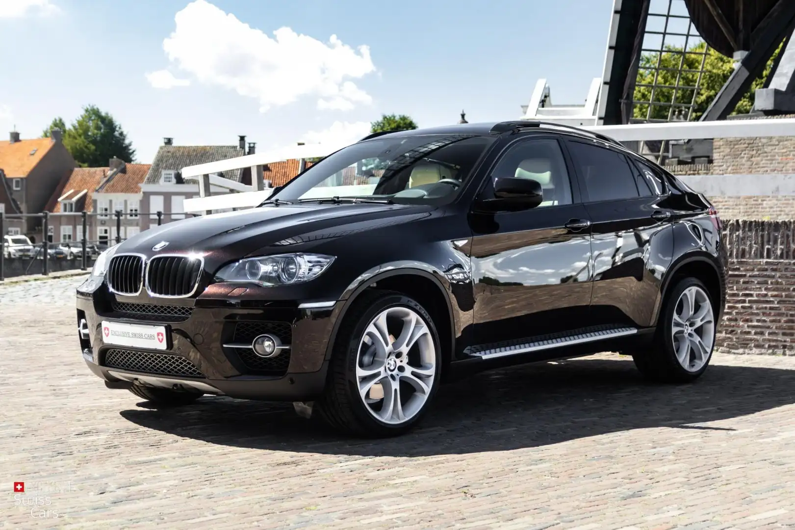 BMW X6 XDrive35i High Executive|Pano.|Head-Up|Acht. rij c Zwart - 1