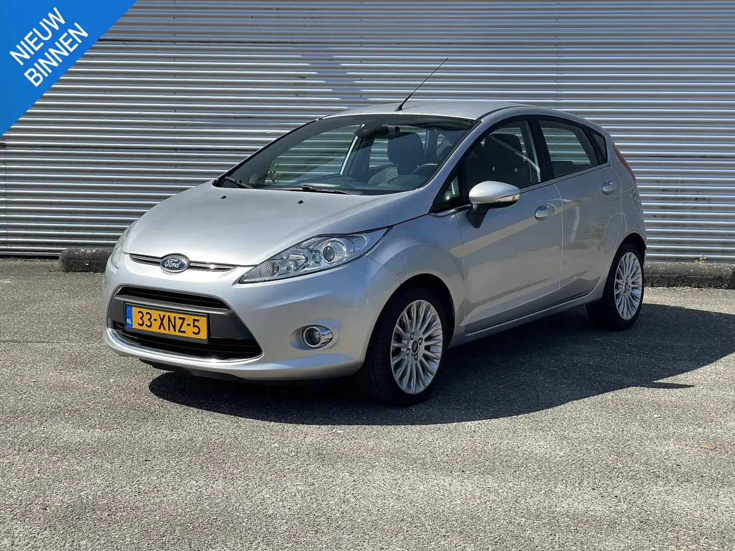 Ford Fiesta 1.25 Titanium|Verwarmde voorruit Gris - 1