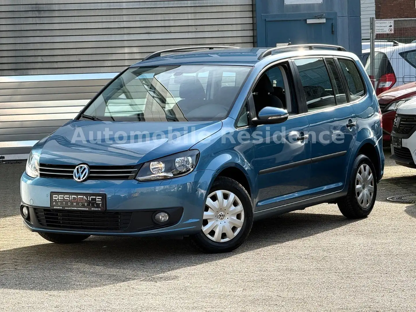 Volkswagen Touran 1.2 TSI*NAVI*TEMP*7SITZER*AHK*SHZ*2HD*TOP Blau - 1