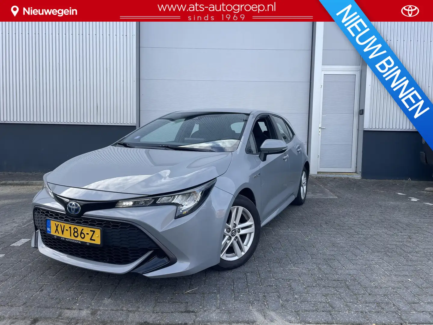 Toyota Corolla 1.8 Hybrid Active | trekhaak | Org NL en Dealerond Gris - 1