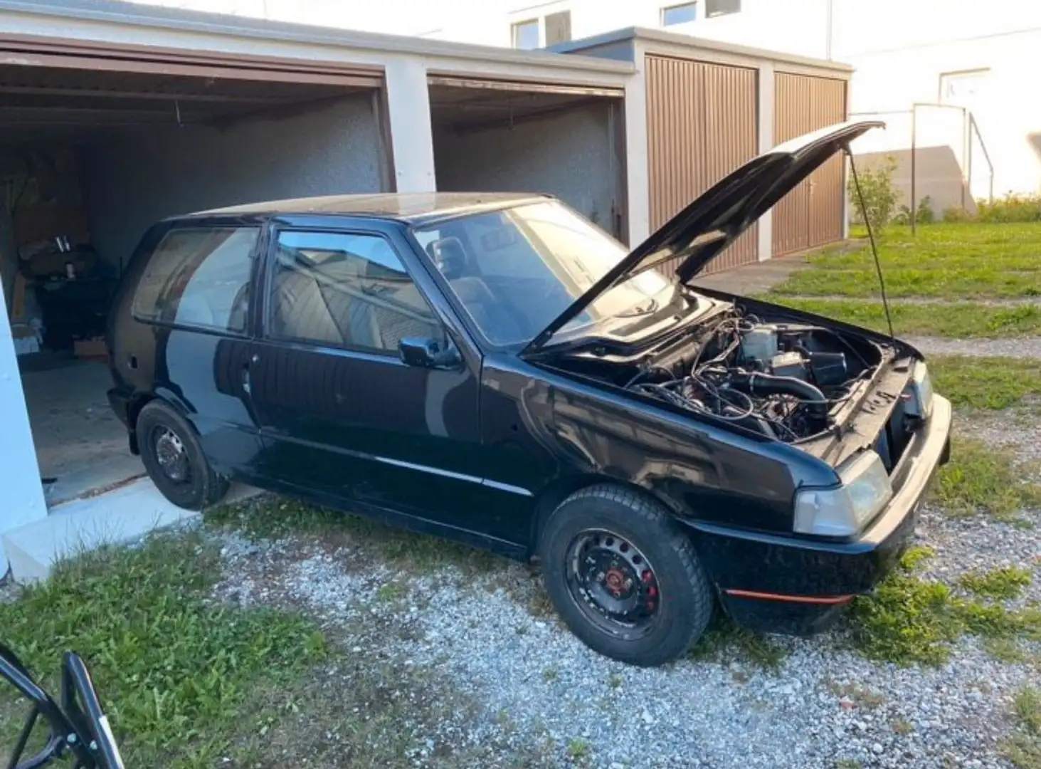 Fiat Uno 3p 1.4 ie turbo Racing Onhe Cat - 1