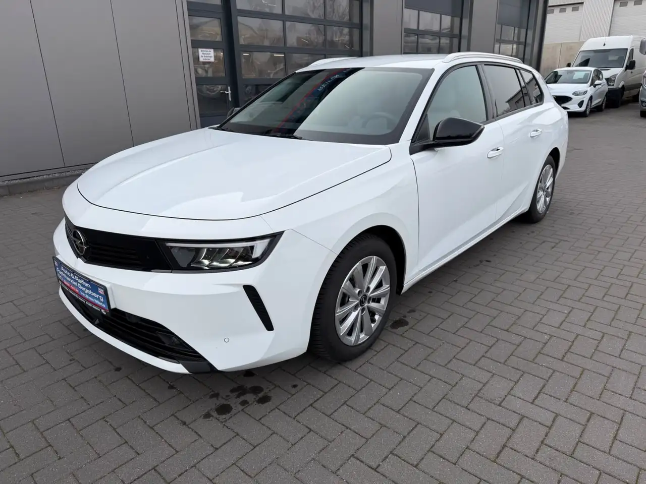 Opel Astra L Sports Tourer 1.2 Elegance*LED*NAVI — миниатюра 1