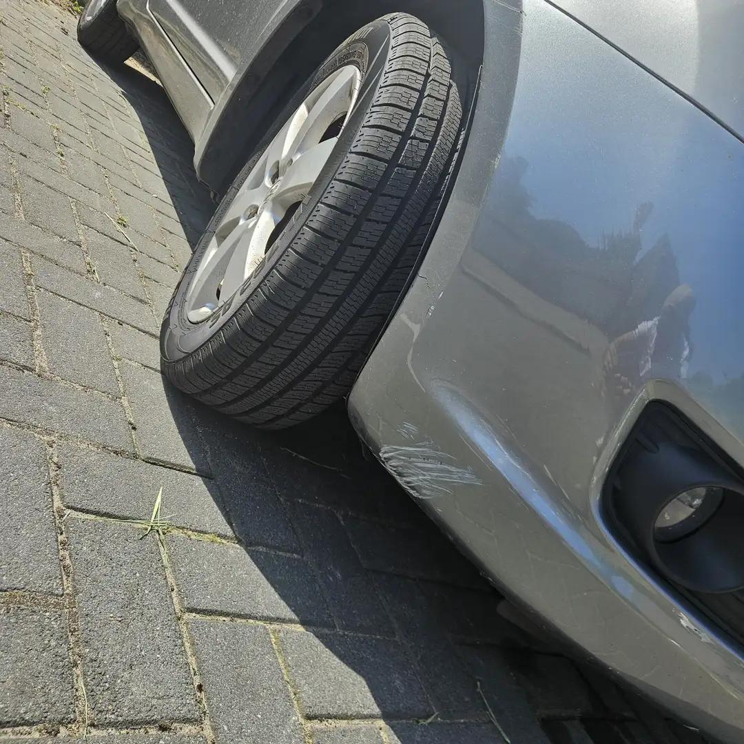 Suzuki Swift 1.3 Limited Grijs - 2
