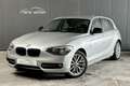 BMW 118 d xDrive Sport Line / GPS / Tel. / Garantie* Grijs - thumbnail 1