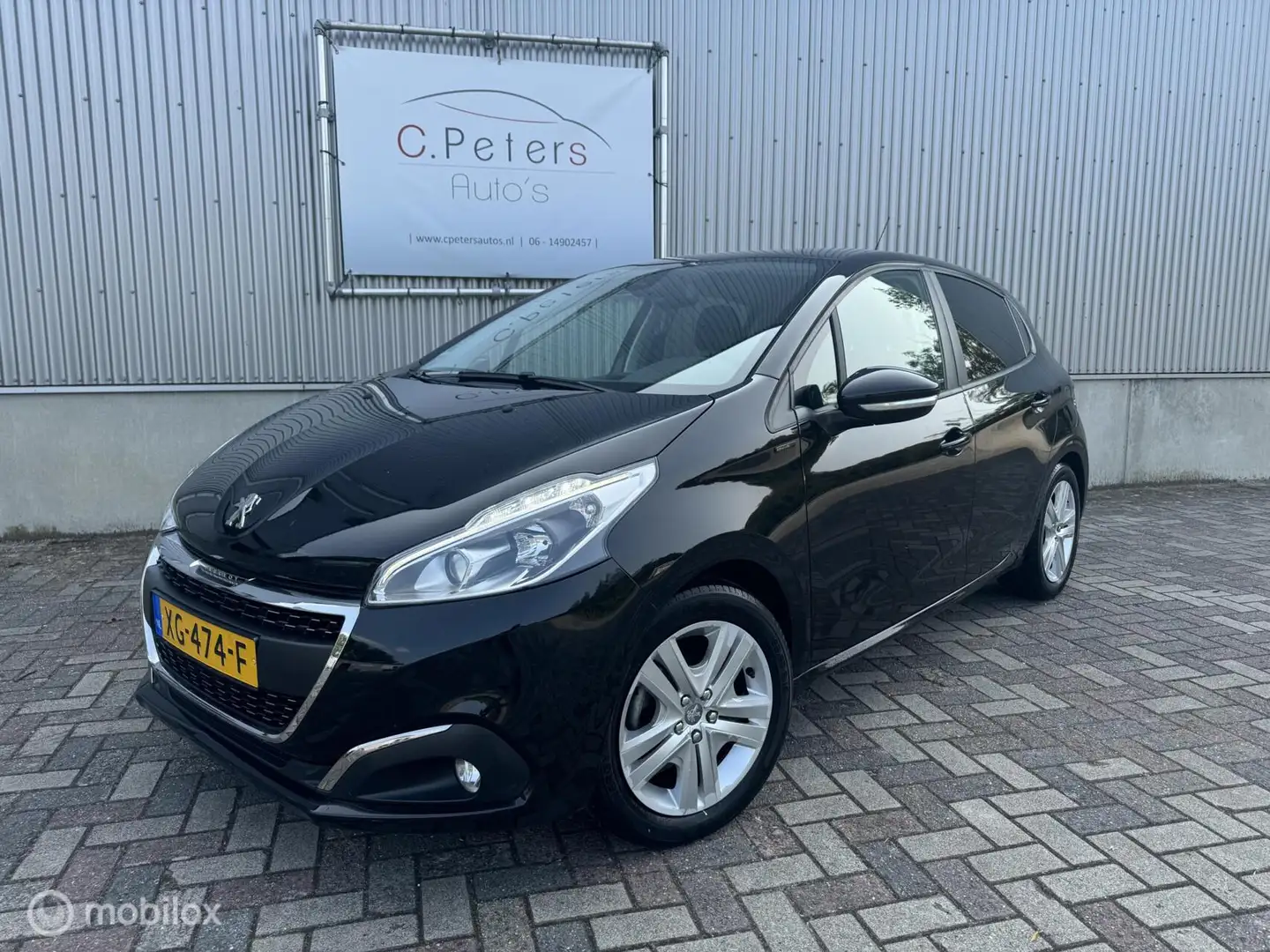 Peugeot 208 1.2 PureTech Signature 2019 / Trekhaak / Carplay / Zwart - 1