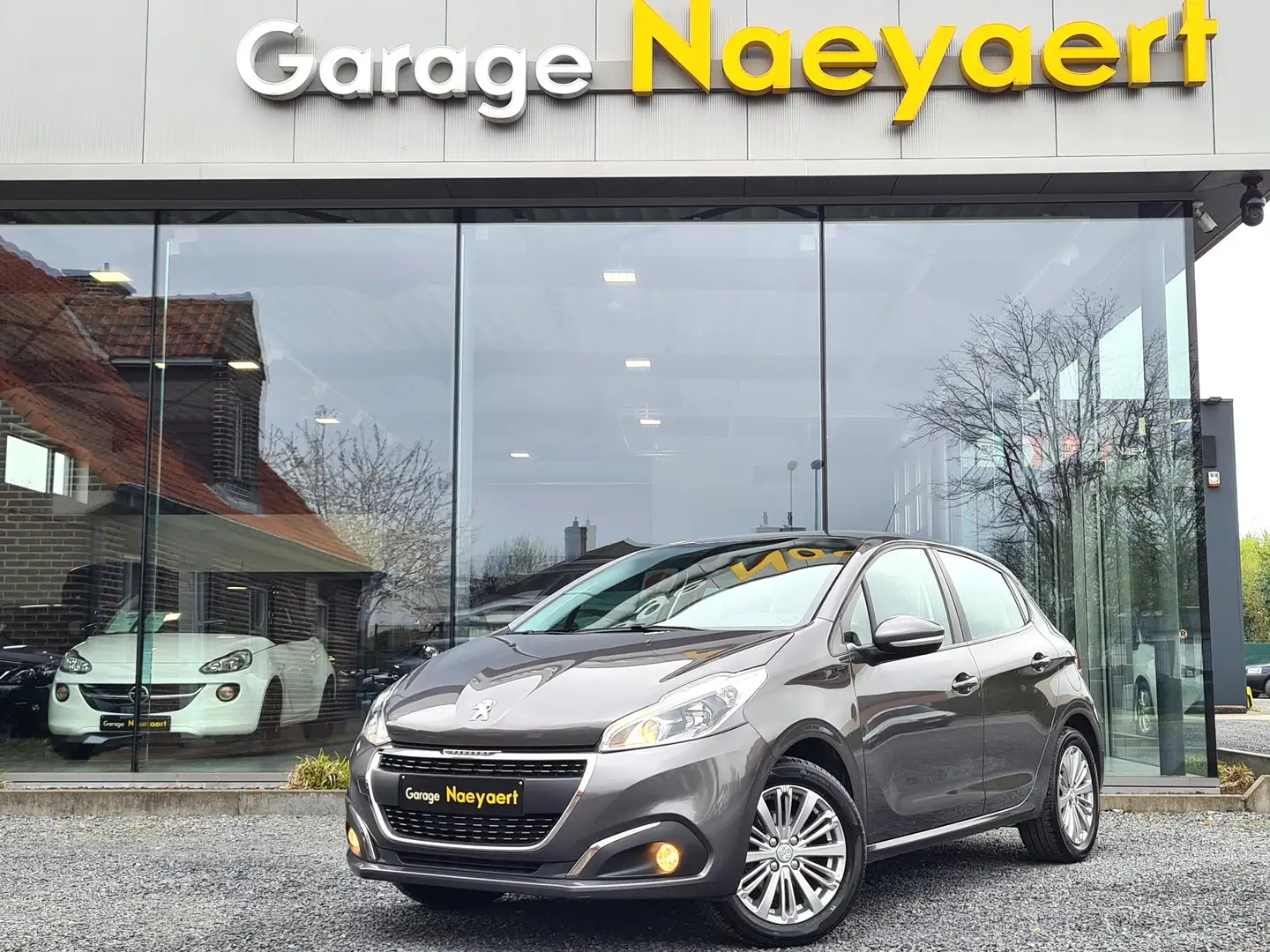 Peugeot 208 1.2i Signature * GPS, ANDROID, AIRCO * Gris - 1
