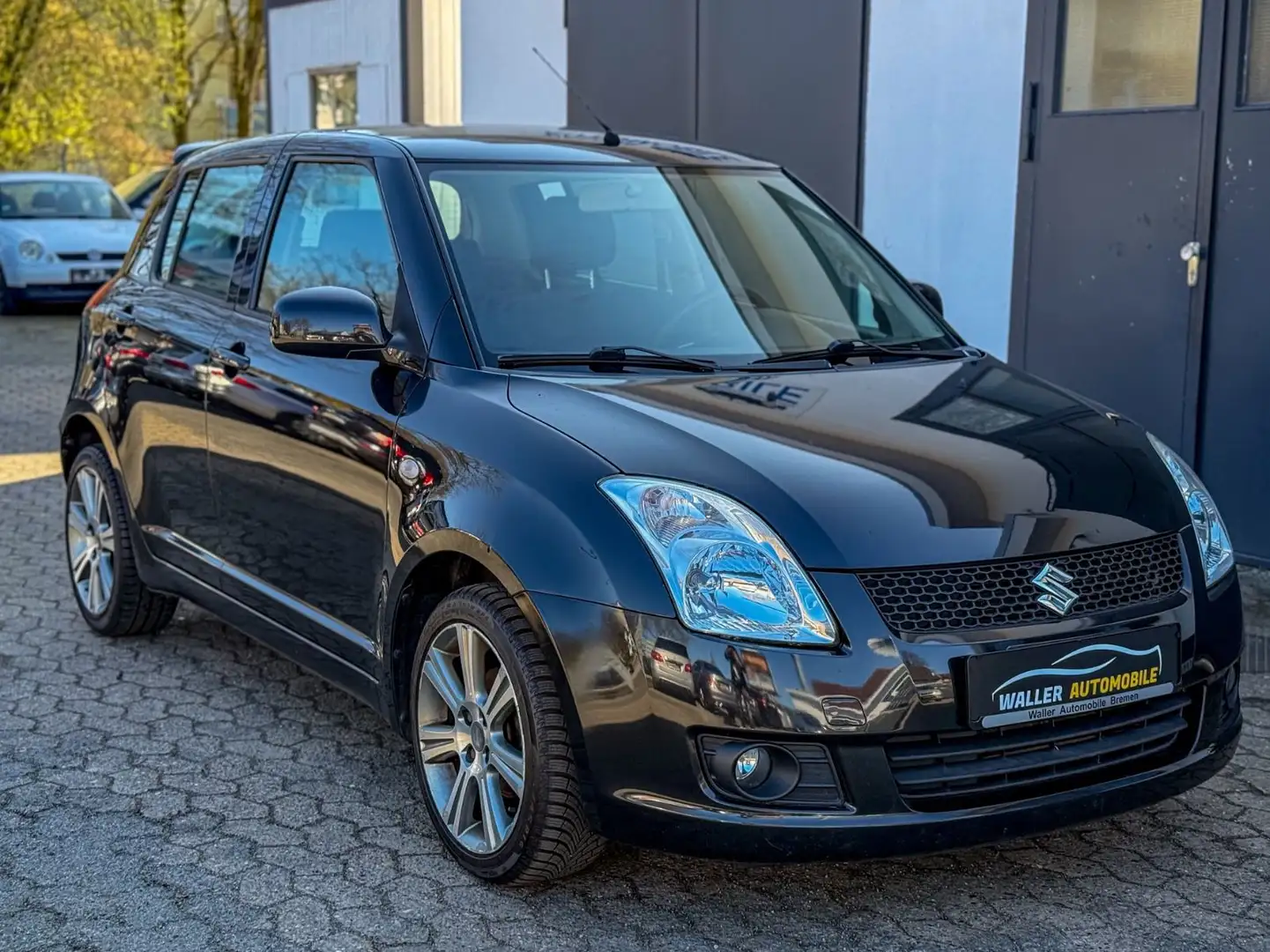 Suzuki Swift 1.5 Lim. 1.HAND|UNFALLFREI|SHZ|KEYLESS Negru - 1