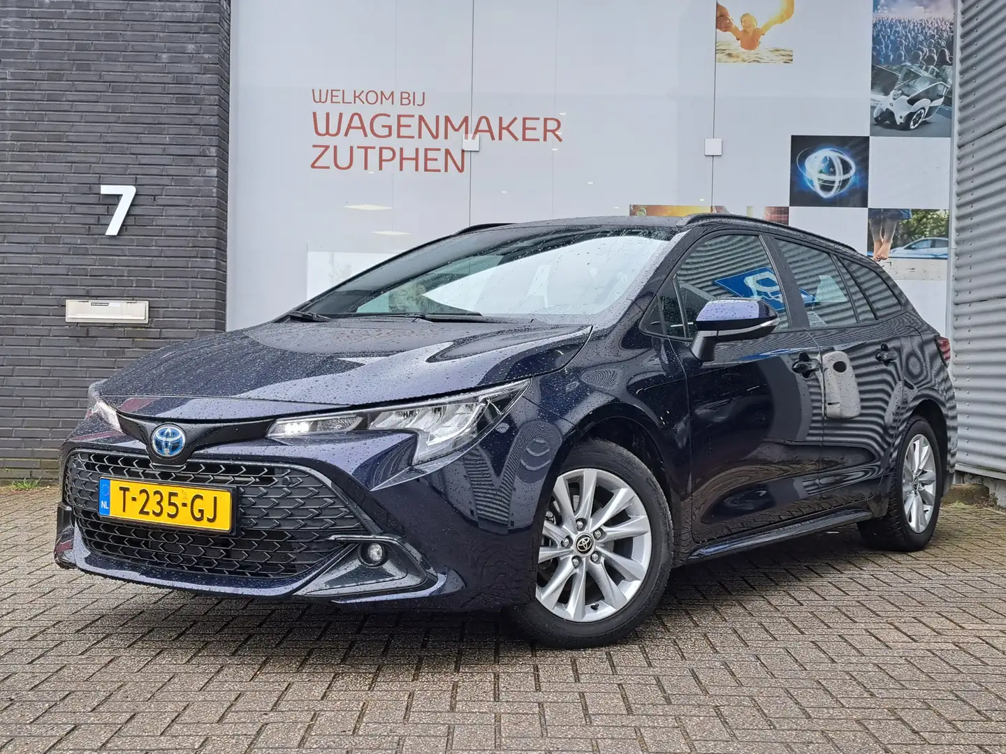 Toyota Corolla Touring Sports Hybrid 140 Active Automaat | ACHTER Blauw - 1