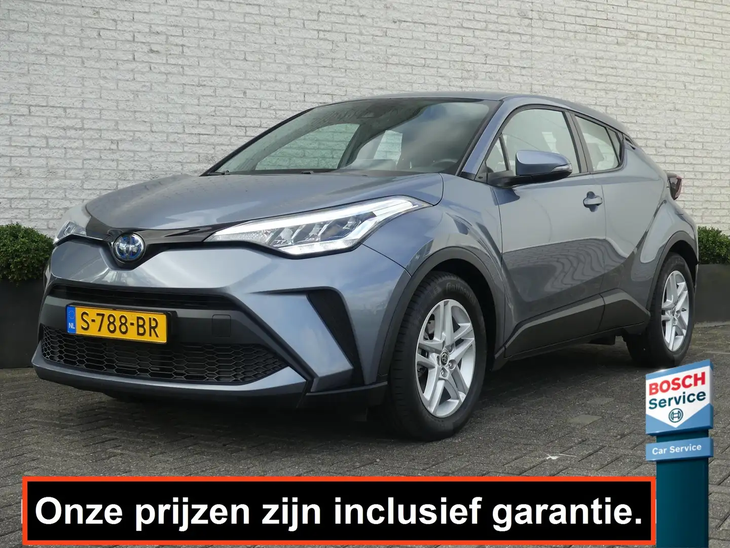 Toyota C-HR 1.8 HYBRID ACTIVE 122PK NAVI*/TREKHAAK/CAMERA/CLIM Grijs - 1