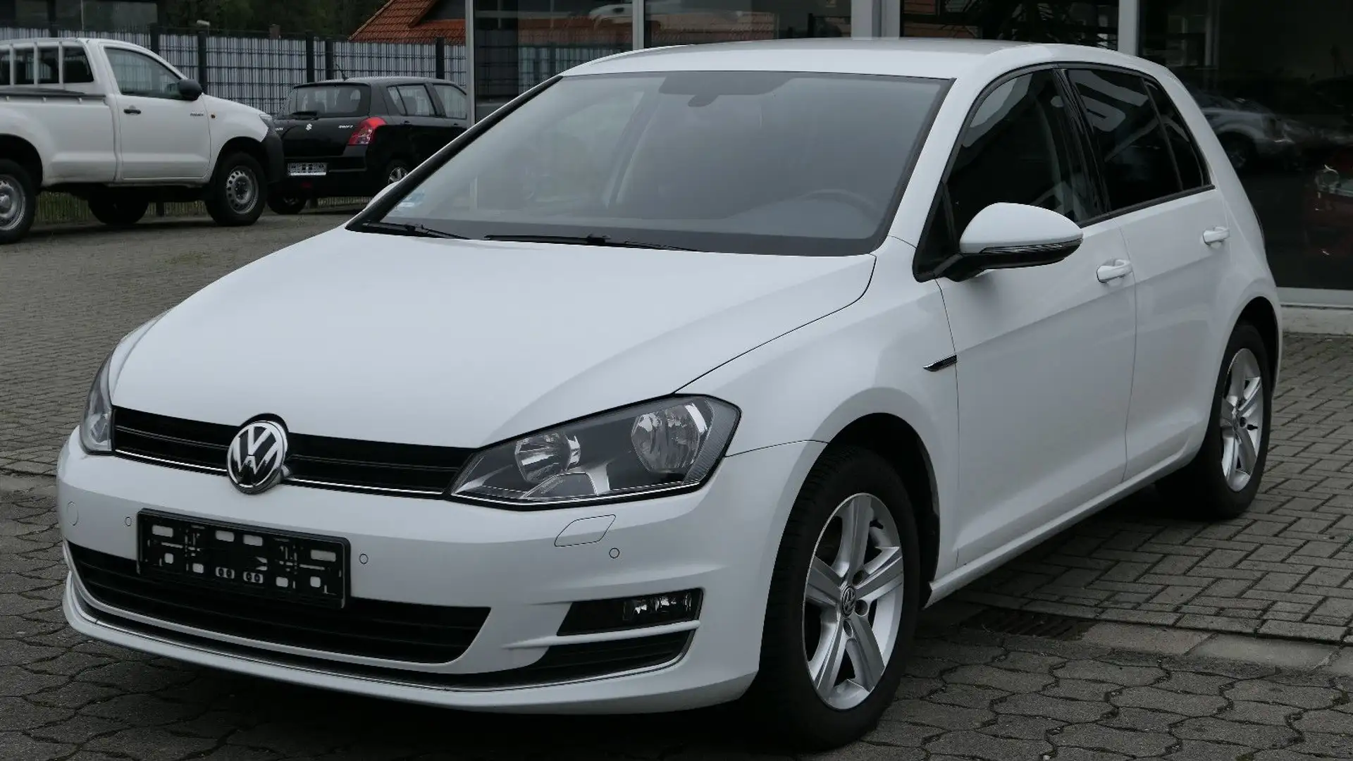 Volkswagen Golf VII Lounge Klimaaut./PDC/MFL/Navi/Scheckhef Wit - 1