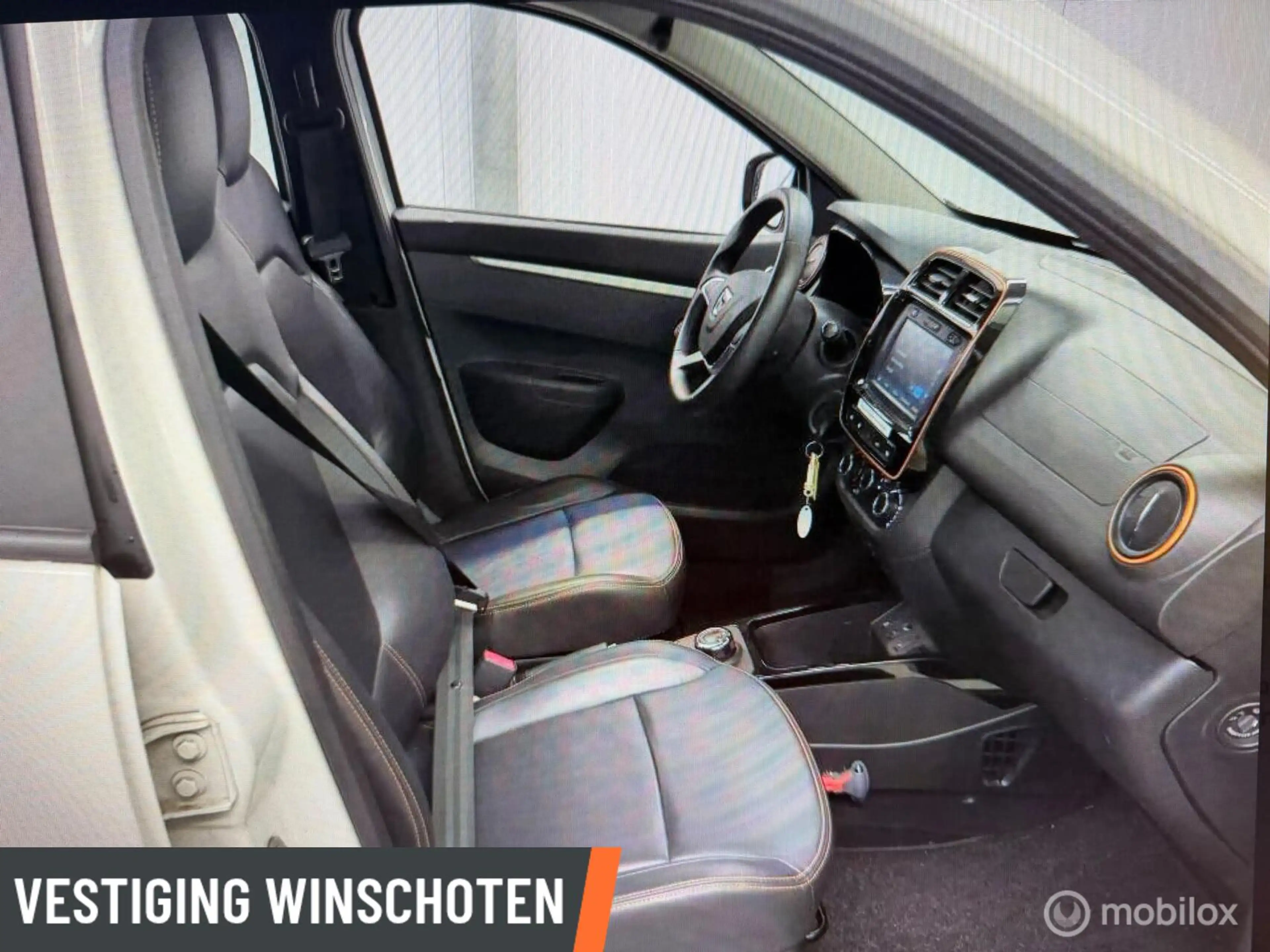 Dacia Spring Business 27 kWh | Airco | Lederen Bekleding | Came — photo 2