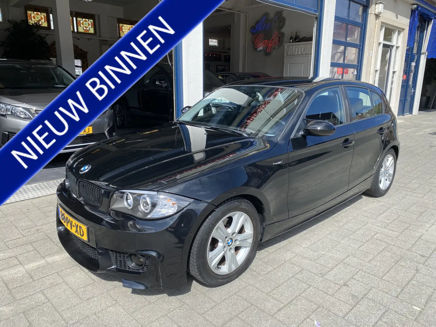 BMW 118 1-serie 118i NL AUTO. Zwart - 1