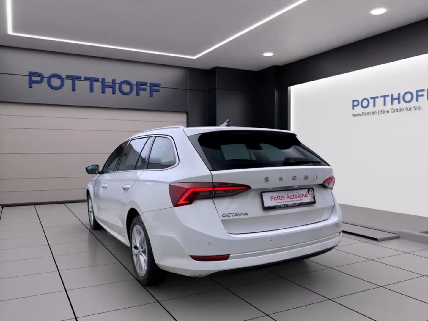 Skoda Octavia Combi 2.0 TDI STYLE NAVI KLIMA PDC LED Weiß - 2