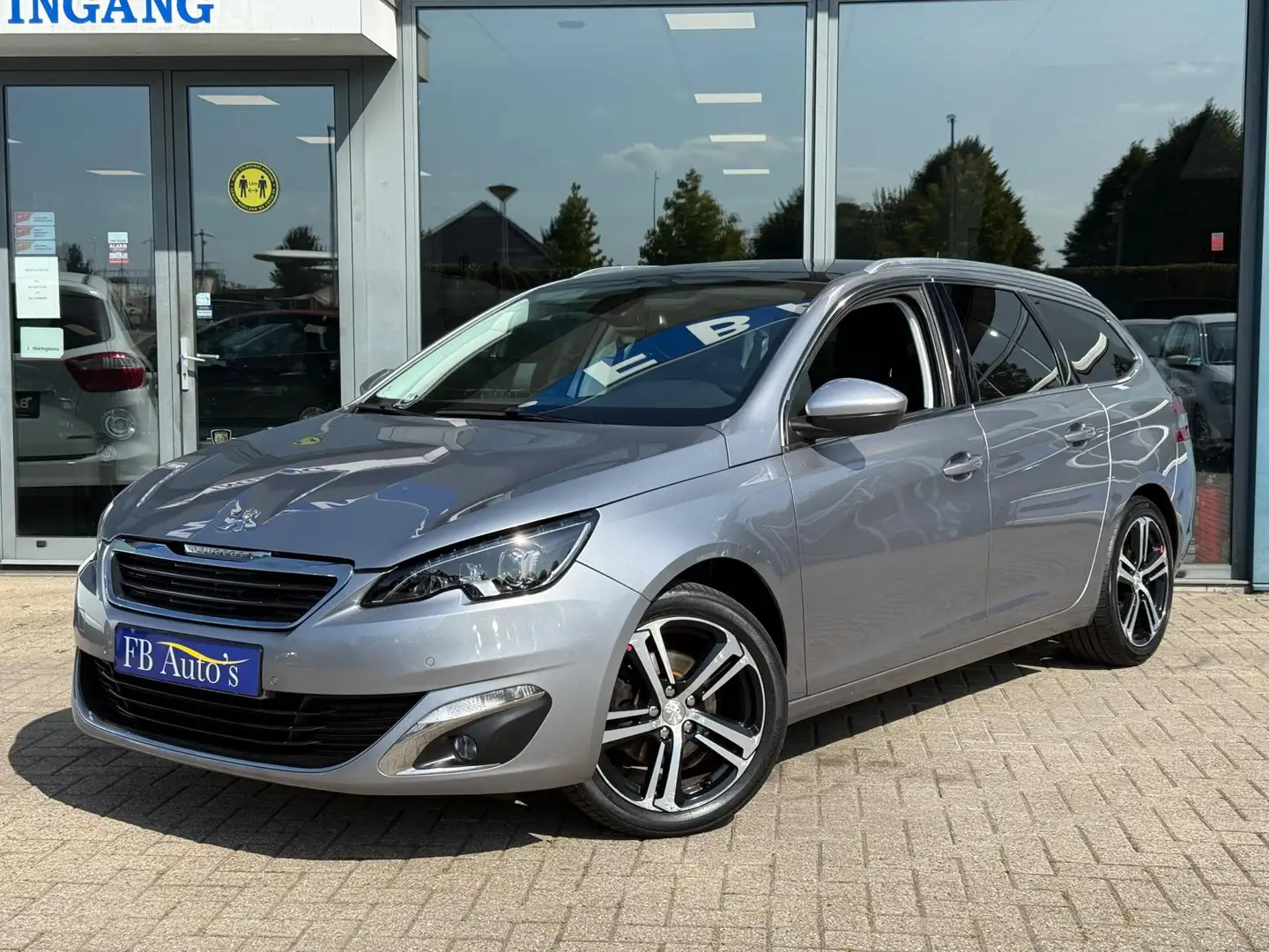 Peugeot 308 SW 1.2 PureTech Blue Lease Premium Airco Lmv Navi Grijs - 1