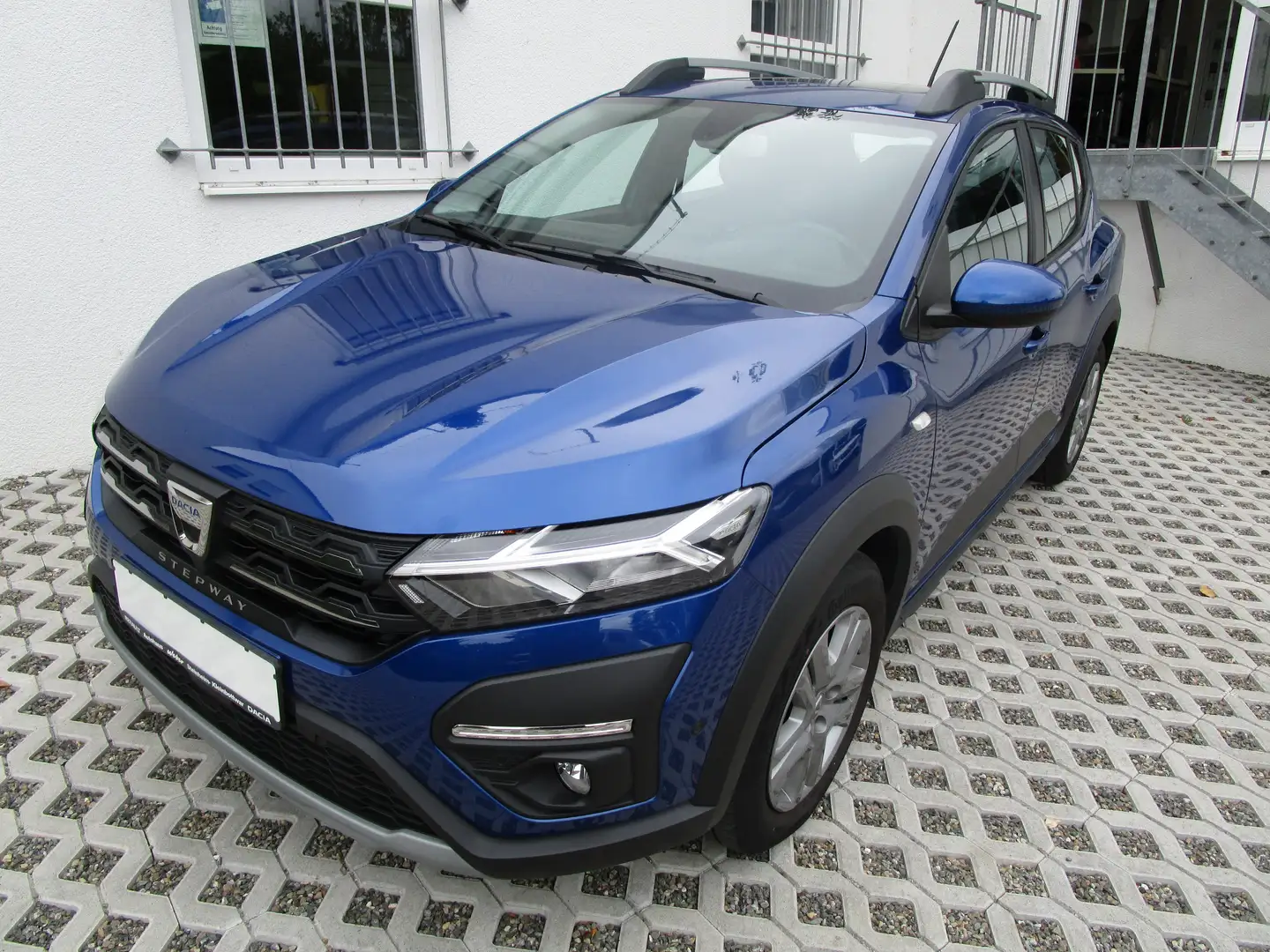Dacia Sandero Stepway Ultimate TCe 110   Schiebedach/Sitzh./Kam. Blau - 1