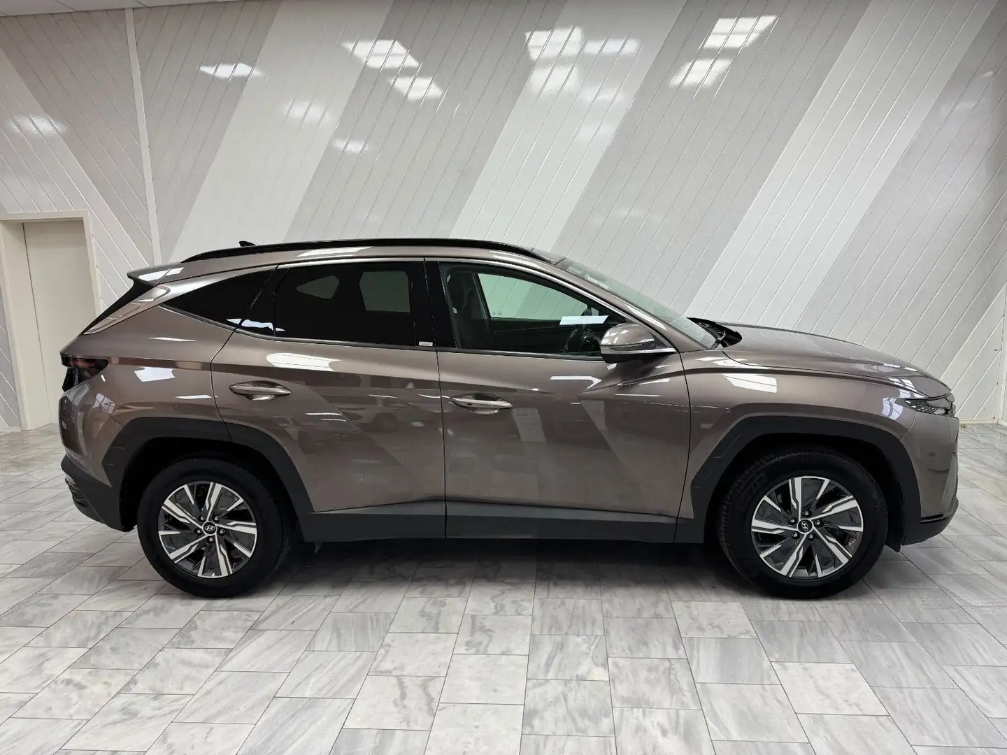 Hyundai TUCSON 1.6 Hybrid Trend Navi Assist 8x bereift Grau - 1